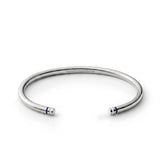Polished sterling silver Blue Line Cuff with navy blue and white end details and engraved somethingaboutus logo.