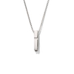 Silver necklace with a rectangular pendant on a white background