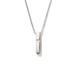 Silver necklace with a rectangular pendant on a white background